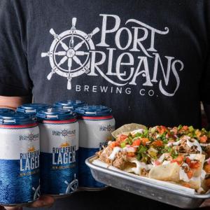 a can of food with a hot dog